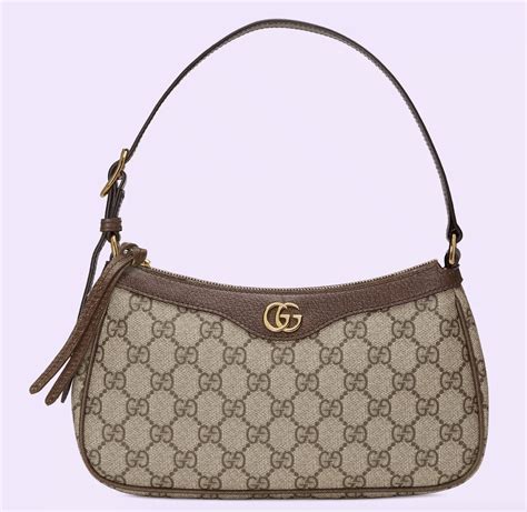 small tan gucci purse|Gucci shoulder pouch.